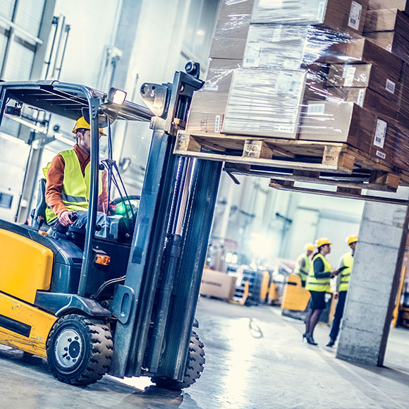 A forklift in a warehouse whose business has plant and machinery insurance with Insure 313.
